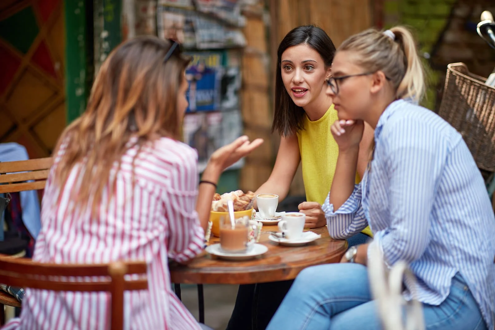  Group of women talking around a cafe table. These women could be talking about therapy for chronic pain in Texas or about yoga for pain in Austin, TX. Read more to learn!  78703 | 78704 | 78731 